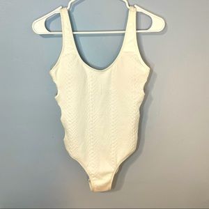 NWT swimsuit by Primark size 4 with side rings
